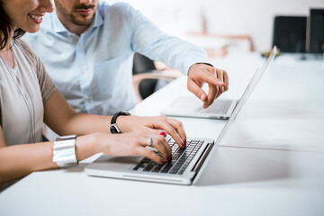 Businessman pointed a finger at notebook, boss pointing on funny post on the computer.