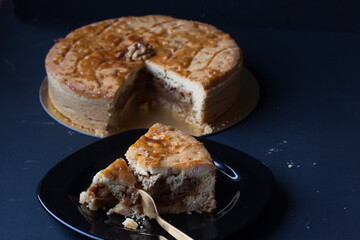 walnut pie on a black background