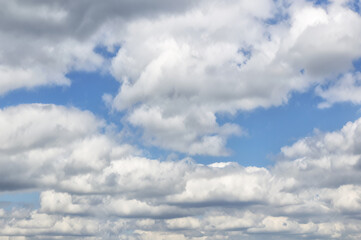 Naklejka na ściany i meble Beautiful summer sky in the clouds