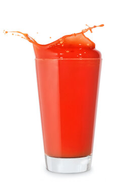 glass of splashing tomato juice