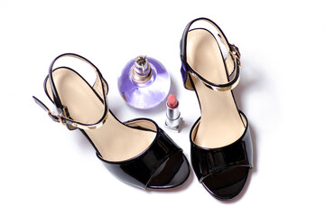 Black sandals and perfumes