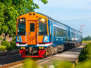 Fototapeta premium Diesel railcars was passing rural station, 2016. (Taken form public platform.)