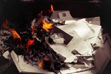 Fire from the torn photos and letters (a rupture of the relations)