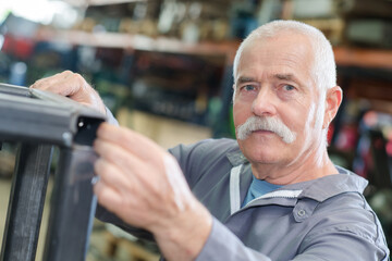 Portrait of senior metalworker