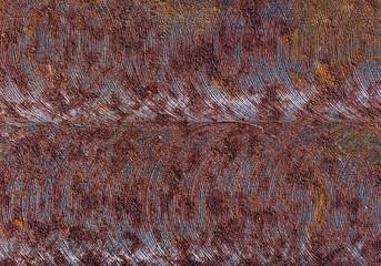 Texture of rusty metal. The milled metal surface is covered in places with a touch of rust