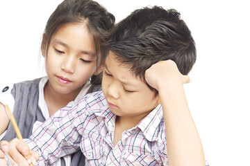 Obraz premium Kid are doing homework together over white background