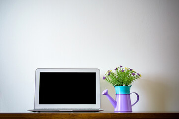 Fototapeta premium laptop on table waiting for someone put some great idea on it