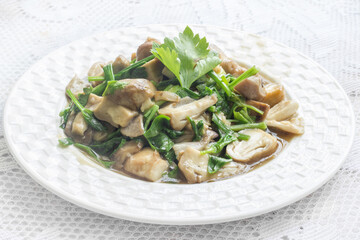 Fried mushrooms in a dish ready to eat.