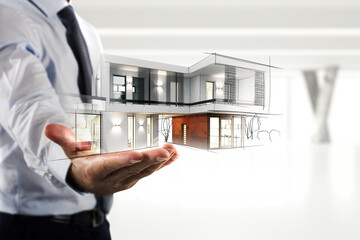 Businessman showing a modern office project