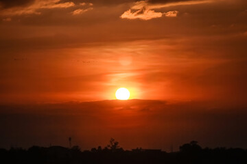 Sun on sunset sky