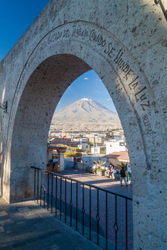 AREQUIPA, PERU - MAY 30, 2015: Misti volcano and arches at Yanahuara square in Arequipa, Peru
