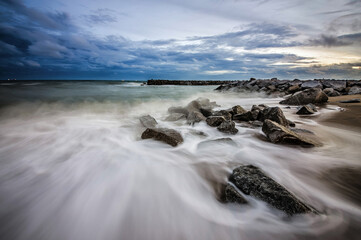 wave at rocky shore