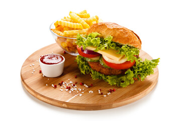 Sandwich with chicken fillet and fried egg 