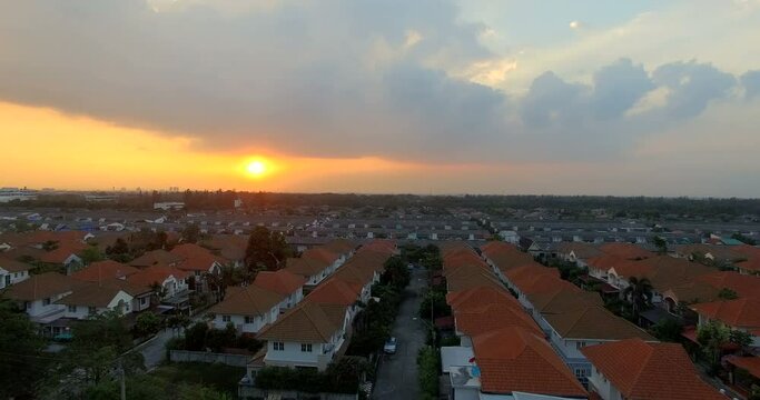 aerial view of sunset sky and home village in bangkok thailand