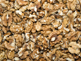 Peeled and crushed walnut closeup