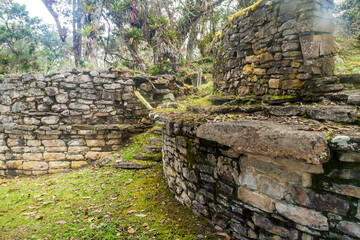 Remnants of round houses in Kuelap, ruined citadel city of Chachapoyas cloud forest culture in mountains of northern Peru.