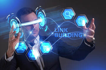 Business, Technology, Internet and network concept. Young businessman working in virtual reality glasses sees the inscription: Link building
