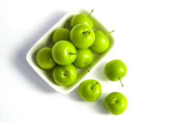 Quality and natural life-giving green sour plums,