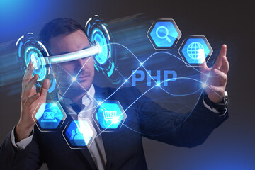 Business, Technology, Internet and network concept. Young businessman working in virtual reality glasses sees the inscription: PHP