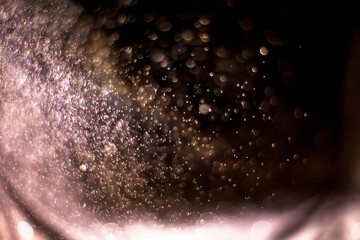 Abstract bokeh glitter background Colorful from the water bubble. Astrology Mystic Galaxy nebula and Outer Space of Universe in Concept To the Infinity and Beyond .