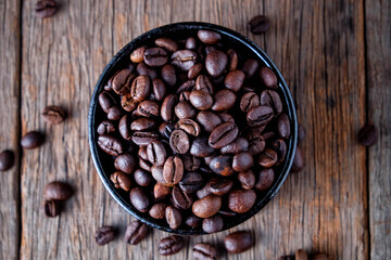 Coffee beans on wooden floor Popular drinks