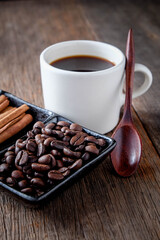 Fototapeta premium Coffee beans with cinnamon A mixture of popular drinks.