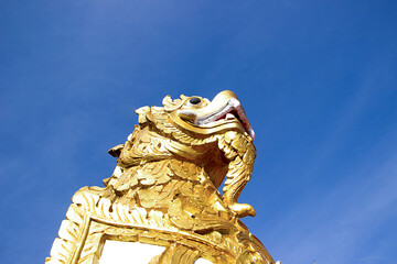 Fototapeta na wymiar Singing statue at Wat Phra That Choom Chum, Sakon Nakhon.