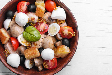 salad with leaf vegetables and chicken