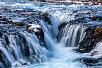 beautiful Bruarfoss waterfall with turquoise water