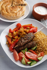 Kebabs with bulgur and vegetables