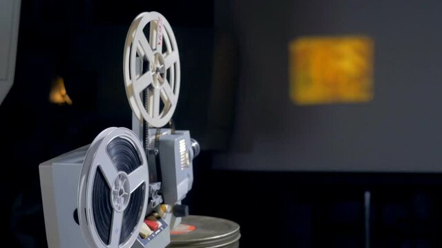 Mechanical movie projector in operation