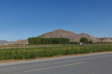 Beautiful landscape with mountain, road and blue sky in Granada