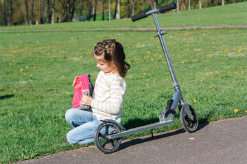 Girl and scooter © eskanderr