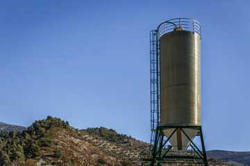 View of a tank in the middle of an arid landscape