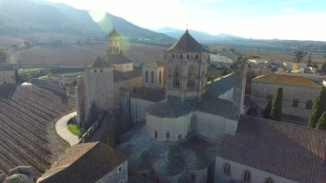 Sunset on Royal Abbey of Santa Maria de Poblet on Conca de Barbera, Catalonia, Spain