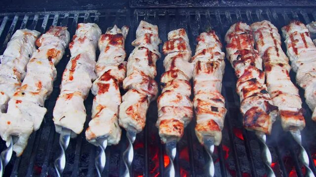Shish kebab cooking on an outdoor grill
