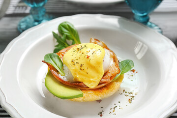 Egg Benedict on plate, closeup