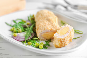 Delicious Cordon Bleu chicken on plate