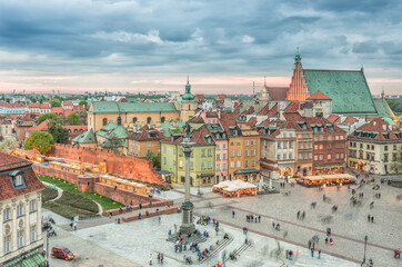 Fototapeta na wymiar Warsaw, Poland, panorama of old city with Zamkowy square, king Sigismund statue and st John cathedral