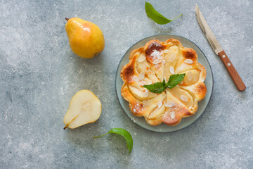 Pear cake over gray background