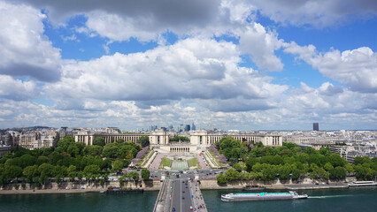 Fototapeta na wymiar Aerial view of Trocadero gardens from Eiffel tower with beautiful scattered clouds, Paris, France