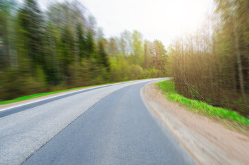 Fototapeta premium Turn on an asphalt road in the forest.