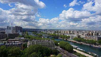 Fototapeta na wymiar Aerial view of river Seine from Eiffel tower with beautiful scattered clouds, Paris, France