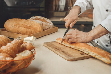 Bakery chef cooking bake in the kitchen professional