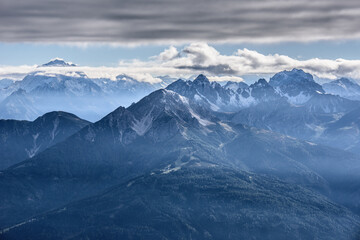 View from Hafelekarspitze at Innsbruck to mountain scenery of Stubai Valley and Innsbruck, Austria