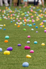 Colorful plastic Easter eggs on a green lawn at a Church Easter Egg Hunt