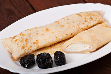 Pancakes stuffed with cheese, delicious food.