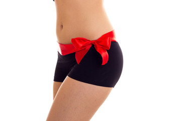Woman's buttocks with red bowtie