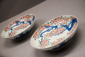 Floral and tree pattern on antique asian porcelain plates