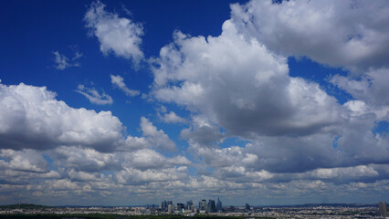 Aerial view of Paris from Eiffel tower with beautiful scattered clouds, Paris, France